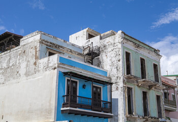 Colorful house facades on bobbled street in historic Old San Juan, Puerto Rico