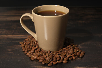 cup of coffee with beans