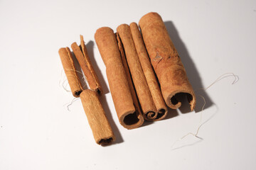 cinnamon sticks isolated on white