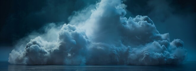 Obraz premium A large, dense cloud of smoke on the ground with a dark and moody background.