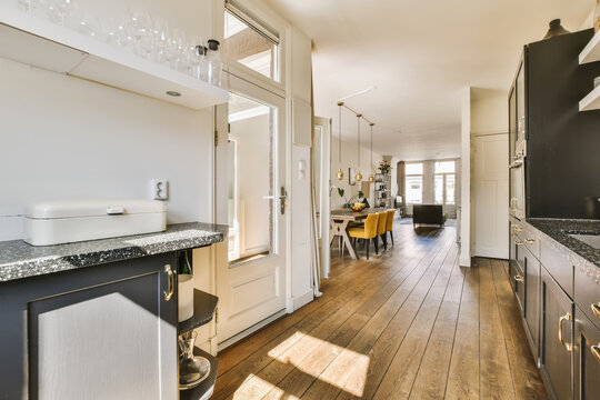 Modern Kitchen Opening into a Cozy Living Space