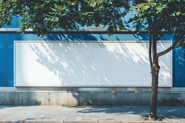 Advertising empty long white billboard with space for mockup information at urban street front view