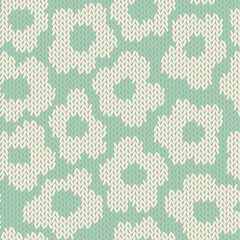 Knitted floral seamless pattern. Fabric imitation vector background. Flat style knit wallpaper with botanical print. Cute design for gift wrap, paper, textile
