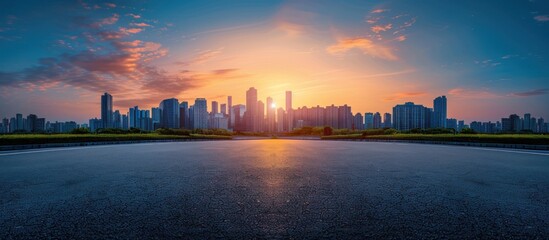 Fototapeta premium Cityscape at Sunset with Empty Road
