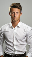 Obraz premium portrait of a handsome cooperate office worker in tidy white dress shirt on white background 