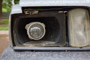 An accident in a parking lot resulted in frontend damage to a car due to a collision