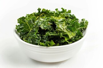 Kale chips with sweet mustard in white dish on white backdrop