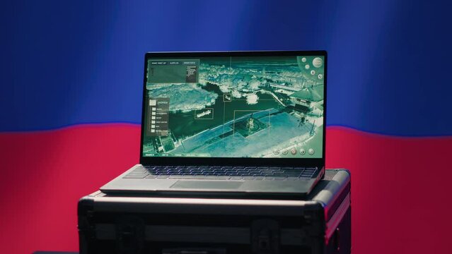 Russian Federal Security Service using radar system to detect ballistic missiles attacking borders. Kremlin regime army using notebook to scan approaching rockets, deploying shields, camera A
