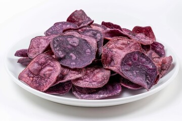 Obraz premium Purple sweet potato chips on white plate with isolated white background
