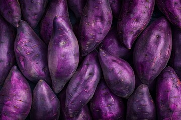 Purple sweet potato texture background featuring natural color palette of fresh violet vegetables...