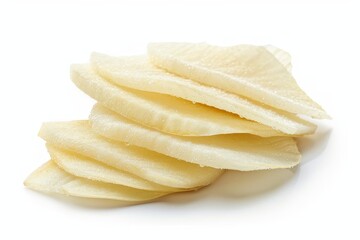 Thinly sliced cassava or tapioca chips isolated on white background with clipping path Popular snack in Asia and Indonesia