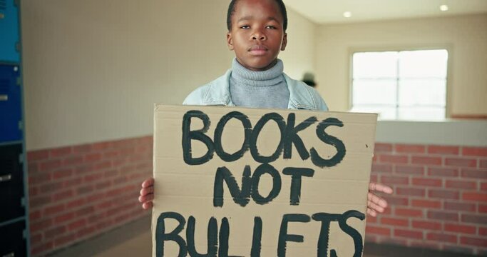 Education, sign and boy for protest against violence, school shooting and weapons in America. Campus, corridor or face of teenager student for awareness, activism and peace for gun crime in hallway