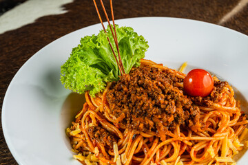 Pasta with minced meat and red sauce