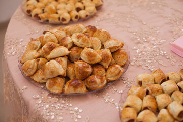 Photograph of salty snacks on a festive table.