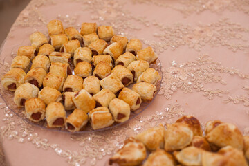 Photograph of salty snacks on a festive table.