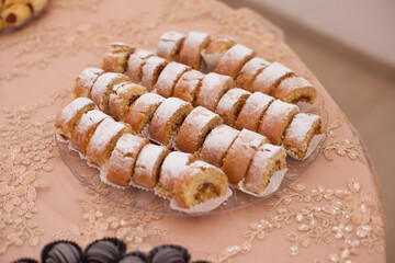 Photograph of sweet snacks on a festive table.