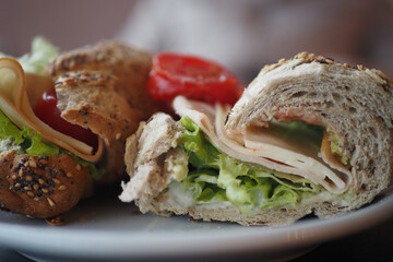 Sandwich With Smoked Chicken Salami on table 
