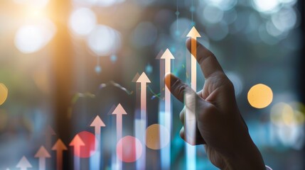 Hand pointing at upward arrow graph, symbolizing growth, success and positive trends in business or finance.