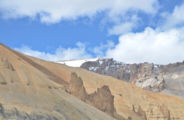 Leh Mountain Peaks Shrouded in Clouds under Clear Blue Sky