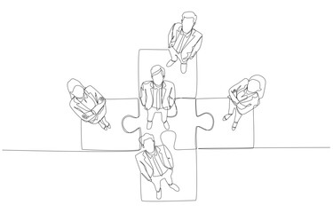 Continuous one line drawing of confident business people standing on connected jigsaw pieces, business collaboration concept, single line art.