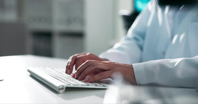 Scientist, hands and typing on computer for research report and development in cancer medical trial. Science person or cell biologist working online or writing article on DNA synthesis in laboratory