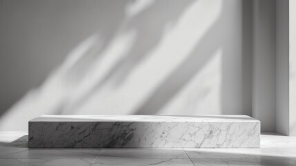 Gray monochrome mockup with a sleek granite pedestal on a light background, minimalist design with soft shadows