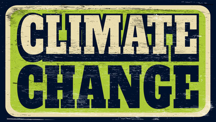 Fototapeta premium Aged vintage climate change sign on wood