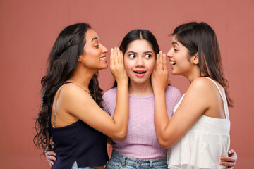 Three Perfect Females Are Laughing And Whispering While Hugging