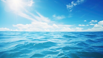 Obraz premium Sunny day over the ocean with blue sky 