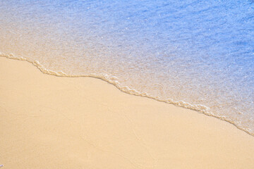 View of background for summer vacation concept. Nature of the beach and sea, summer with sunlight, sandy beach The sparkling sea water	
