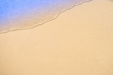 View of background for summer vacation concept. Nature of the beach and sea, summer with sunlight, sandy beach The sparkling sea water	
