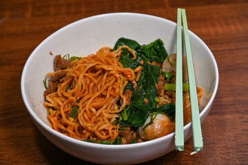 Chicken noodle with beef meatballs, or 