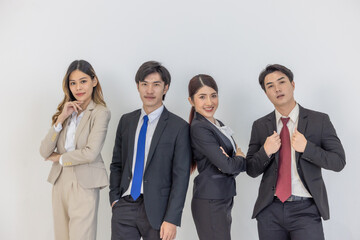 Professional Business Team standing against a plain background