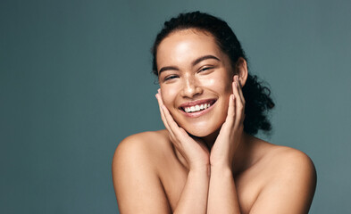 Portrait, shine and woman with skincare, cosmetics and dermatology on gray studio background. Acne...