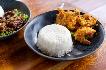 Crispy fried chicken with salted egg sauce
