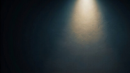 Obraz premium A dark theater stage bathed in a spotlight's glow, revealing a smooth, brushed metal surface