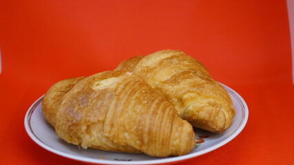 Freshly Baked Croissants on a Plate	
