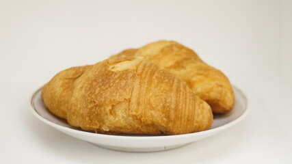 Freshly Baked Croissants on a Plate	
