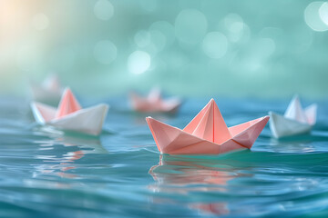 Obraz premium Colorful Origami Paper Boats Floating on Calm Water with Bokeh Background in Soft Sunlight