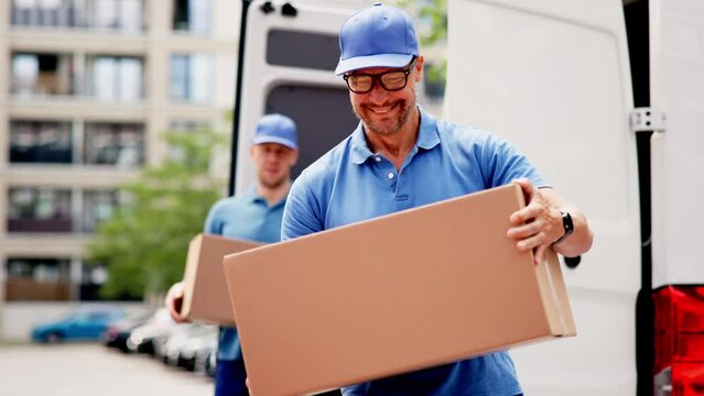 Professional Mover Unloading Truck and Installing Furniture