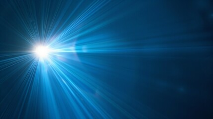 Fototapeta premium A single burst of light against a dark blue background.