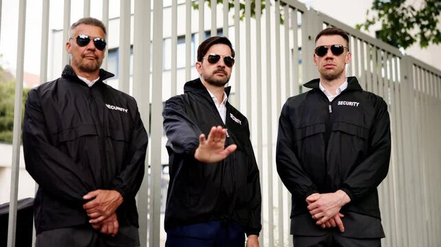 Corporate Bodyguard Service: Professionally Protecting Businessman Outdoors