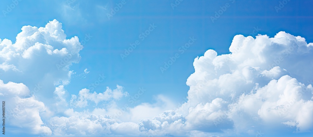 Leinwandbilder close-up of a textured blue sky with soft clouds, ideal as a background image with copy space.