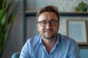 Man Talking To Camera. Caucasian Businessman in Glasses on Webcam Video Call at Modern Office. Financial Advisor Consulting Client Online. Business Coach Virtual Manager Executive Leader.