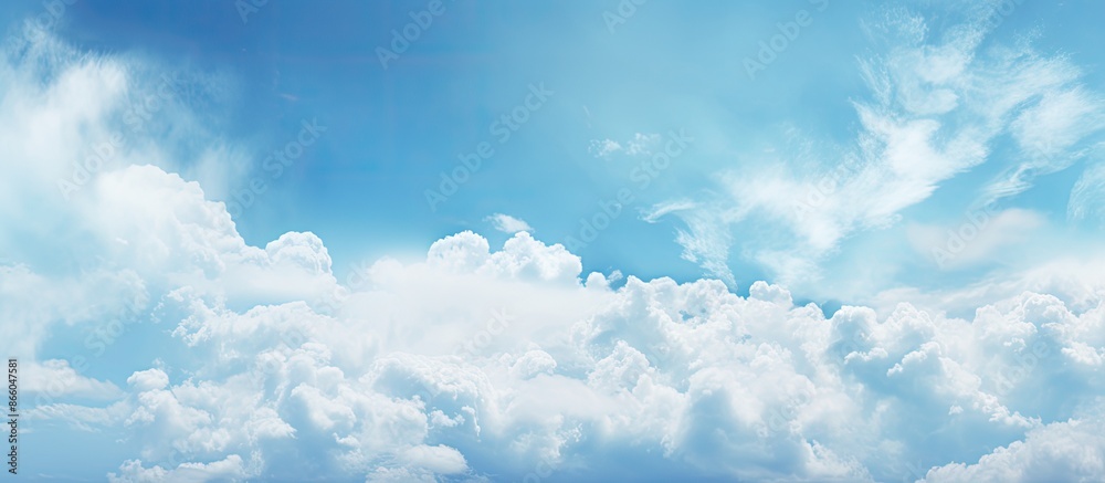 Fototapete Close-up of a textured blue sky with soft clouds, ideal as a background image with copy space.