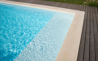 details of beautiful modern pool, stone, wood