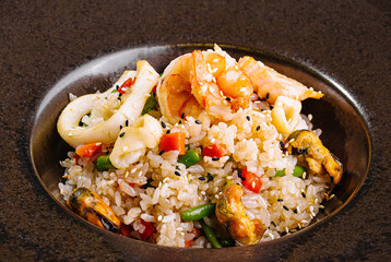 Gourmet asian fried rice dish on elegant tableware