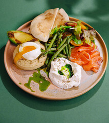 Gourmet brunch with poached egg and smoked salmon