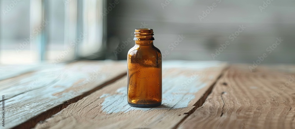 Poster medical drops bottle on a white wooden surface with a blurred background providing ample copy space 