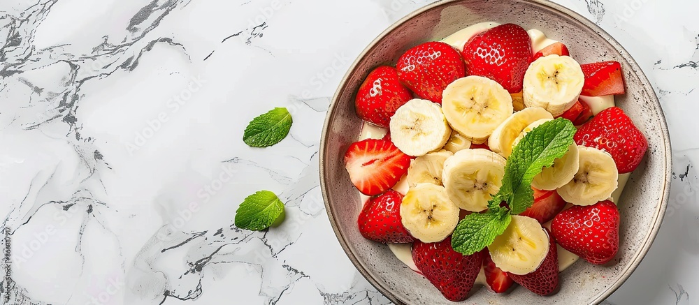 Aufkleber strawberry dessert with fresh banana on a marble background features a copy space image.